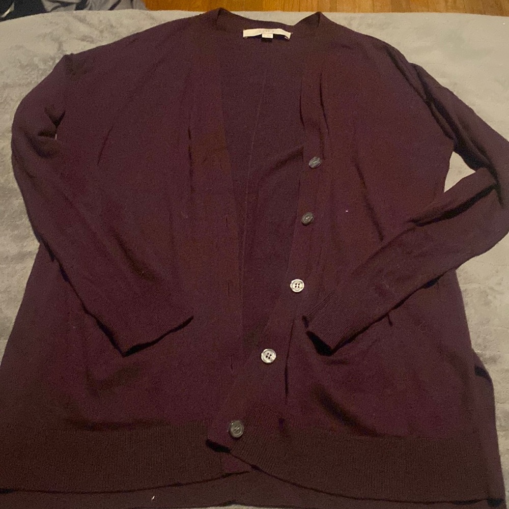 Great condition burgundy cardigan. All buttons perfect. Soft material